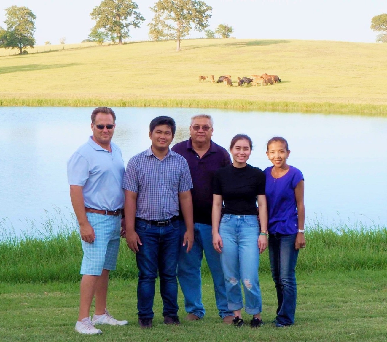 Ben with the Santi Farm partners at the Texas pond